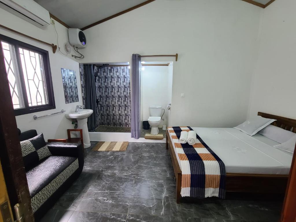 Giường trong phòng chung tại Seromue