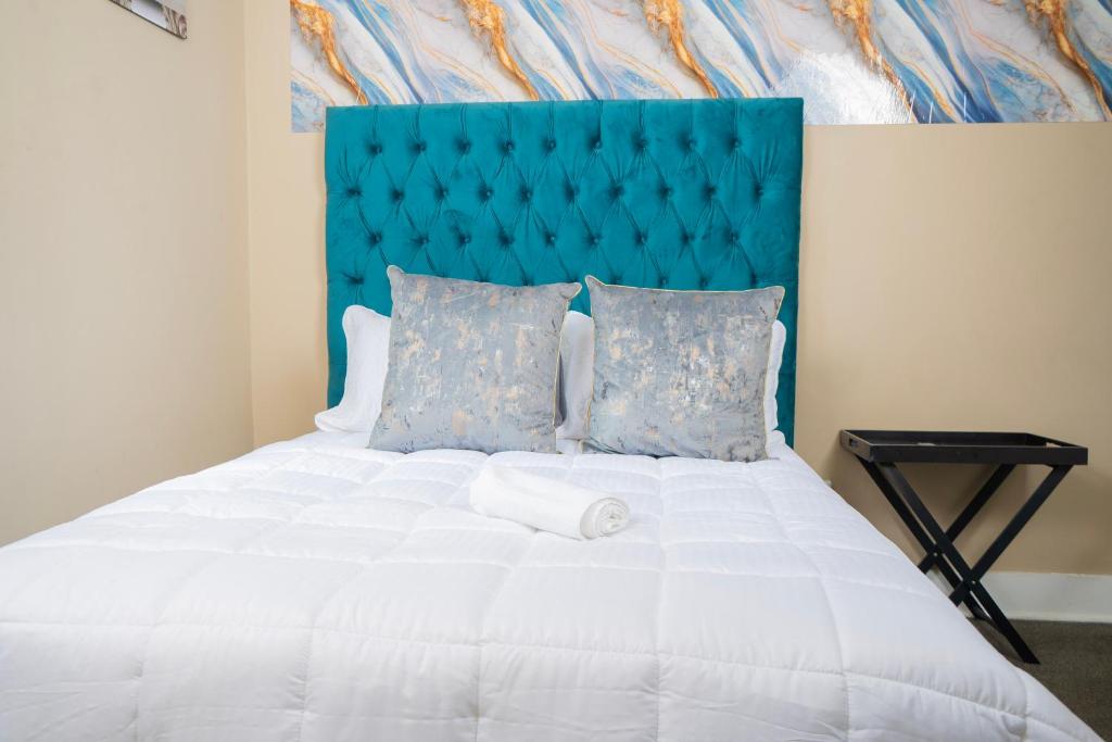 Ένα ή περισσότερα κρεβάτια σε δωμάτιο στο Chic Alberton