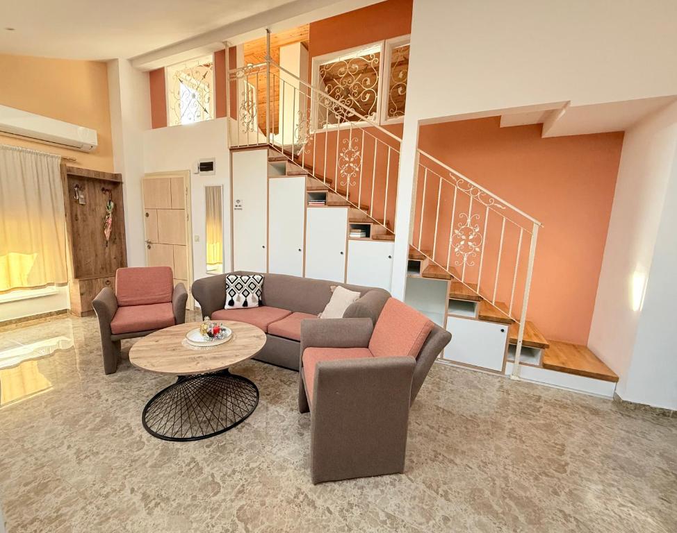 Et opholdsområde på Center Apartments The Quiet Luxury 6