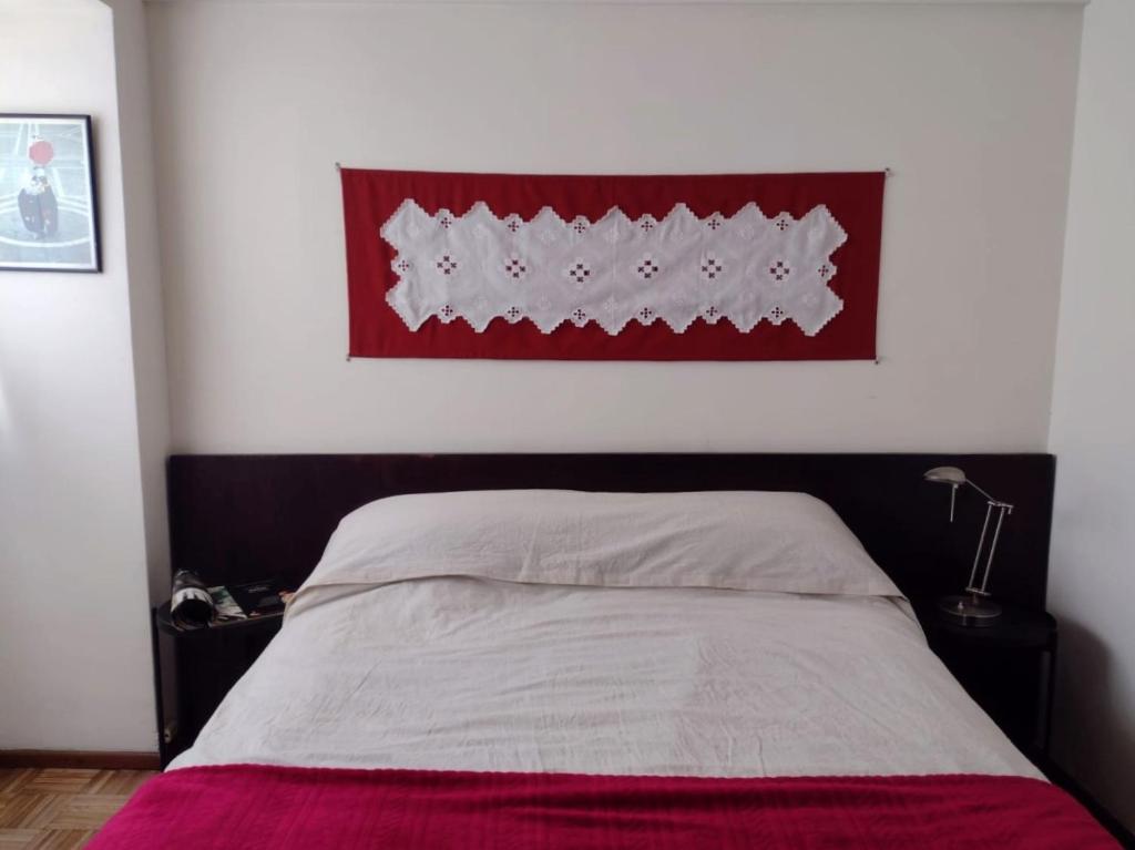 Giường trong phòng chung tại Lapacho Departamento Centrico