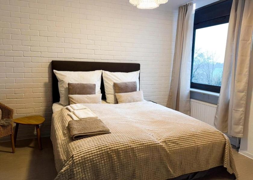 Postel nebo postele na pokoji v ubytování Waldherberge Sargenroth