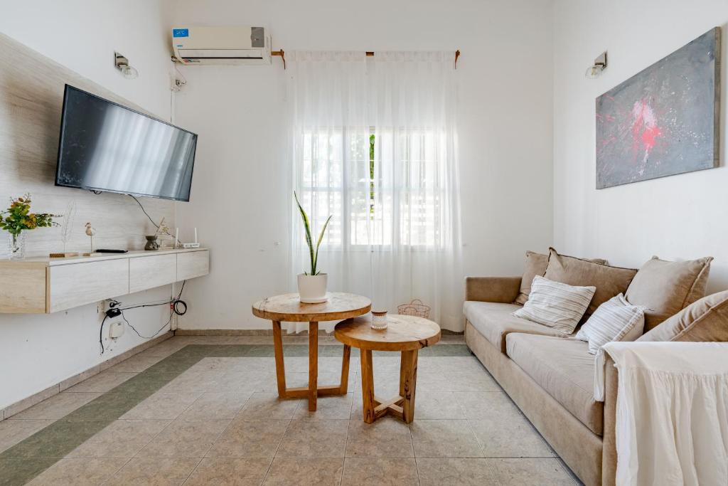 Et tv og/eller underholdning på Familia y Amigos con Pileta, Asador y Cochera