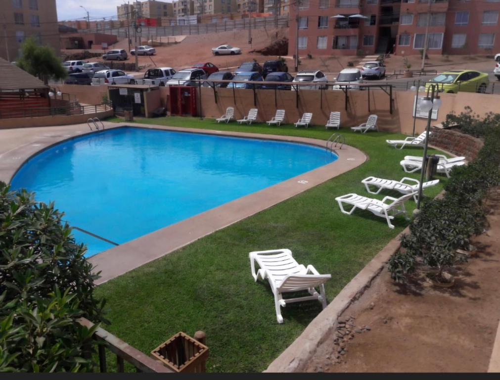 Swimmingpoolen hos eller tæt på Departamento Amoblado