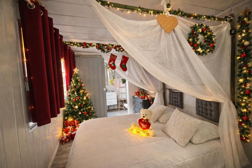 Postel nebo postele na pokoji v ubytování Nuit privilège & spa