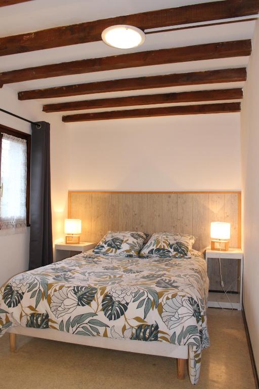 Postel nebo postele na pokoji v ubytování Le moulin de vaux