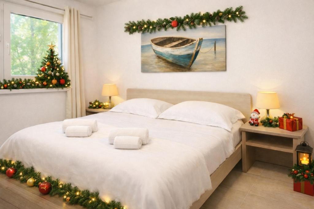 Postel nebo postele na pokoji v ubytování Villa Greif