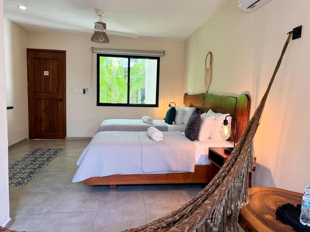 Llit o llits en una habitació de Maculan