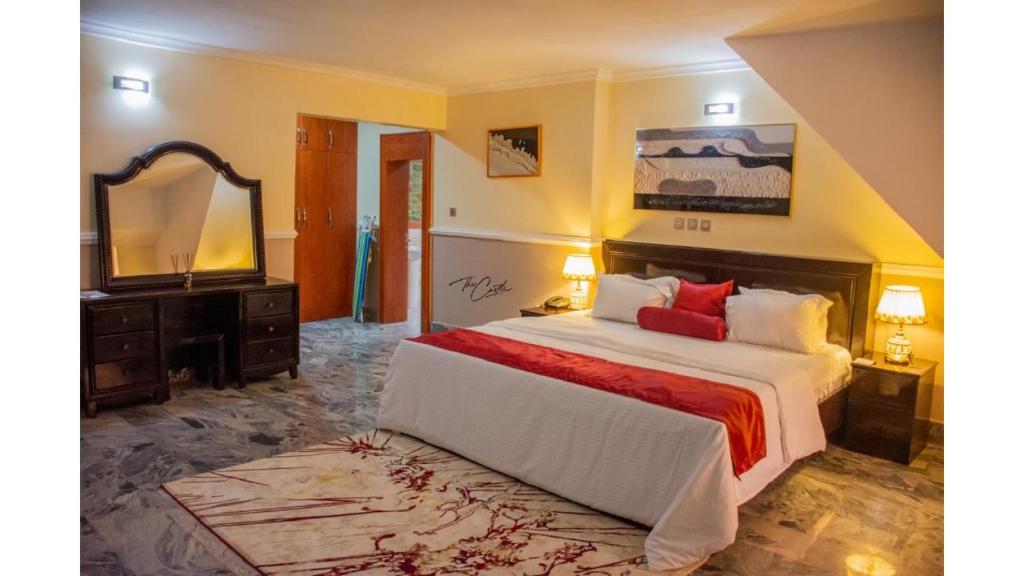 Giường trong phòng chung tại The castle private villa