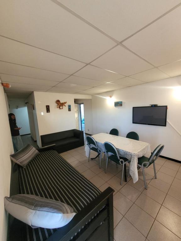 TV a/nebo společenská místnost v ubytování Esquina Sur