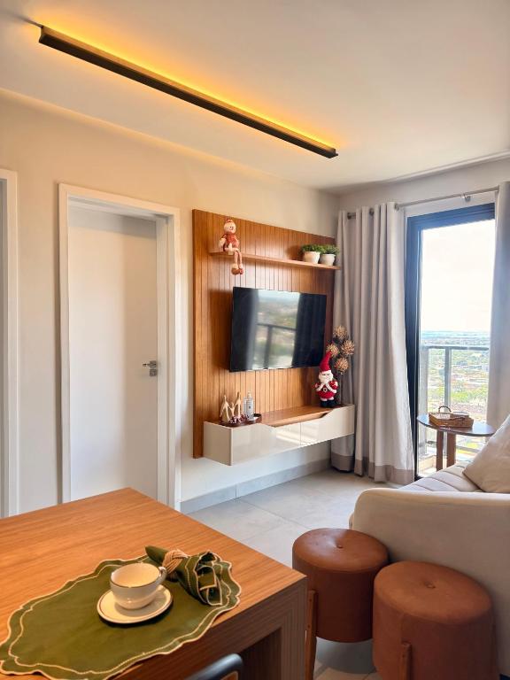 Et tv og/eller underholdning på Flat 1807 - Sunset Experience Alto Padrão