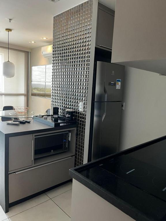 Køkken eller tekøkken på Luxuoso Flat particular ATHOS BULCÃO