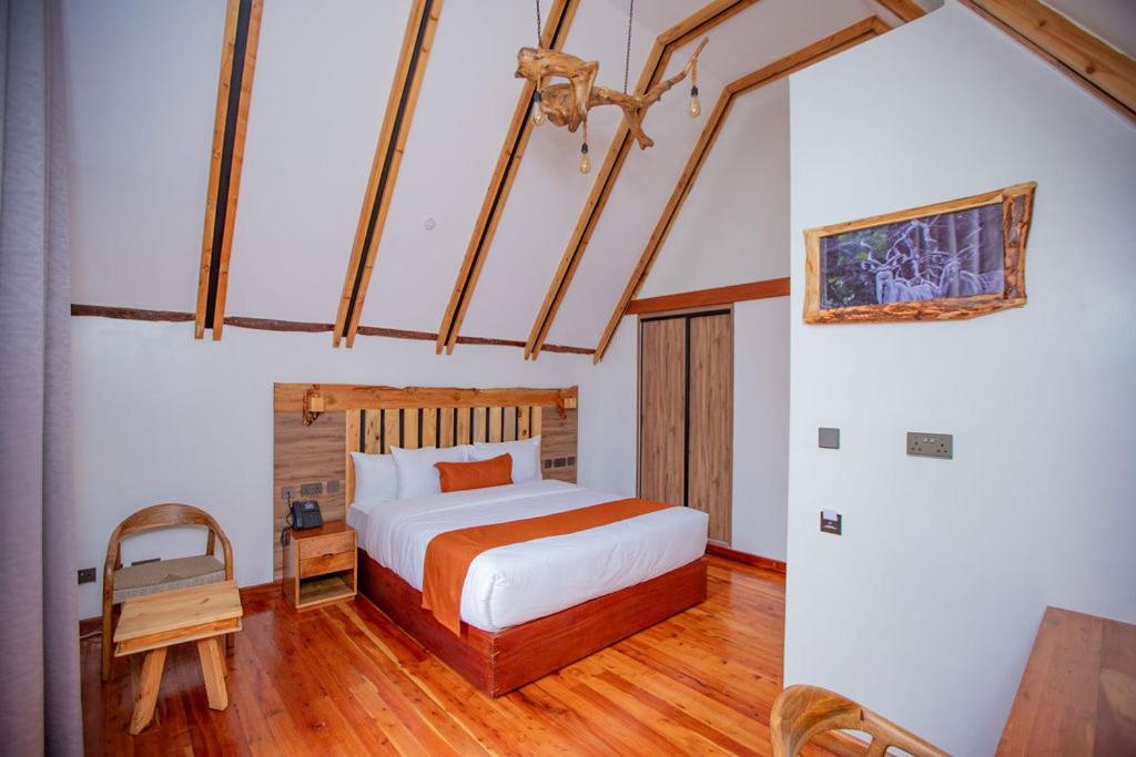 Giường trong phòng chung tại Saiwa Safari Resort