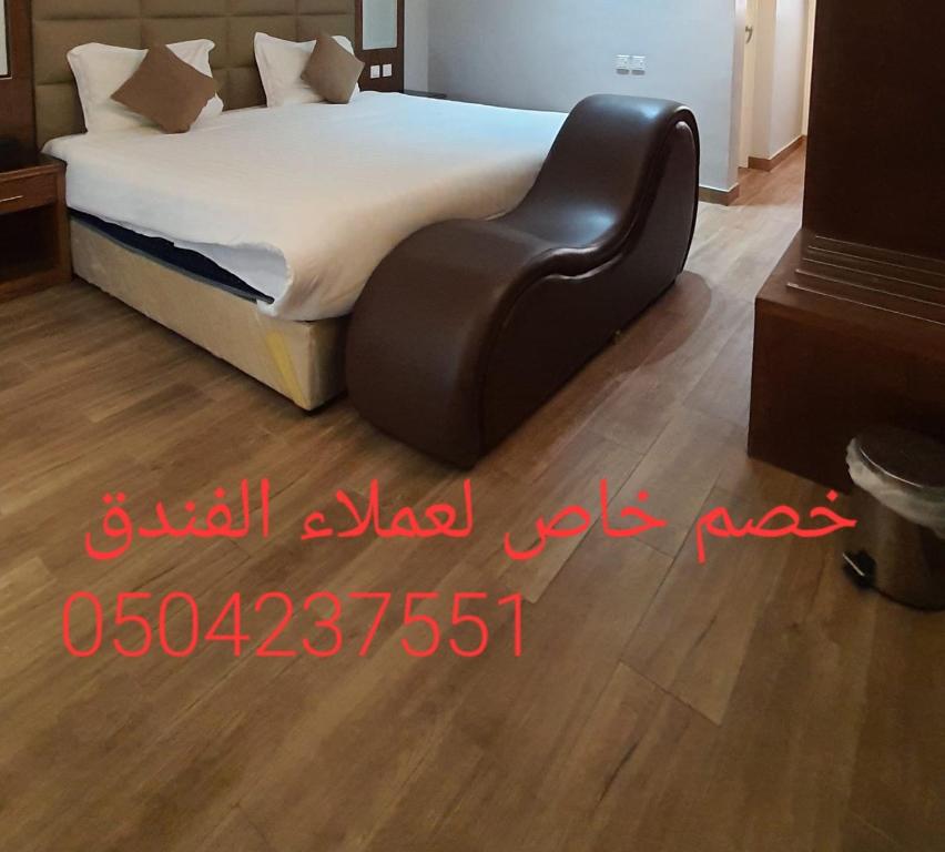 Ένα ή περισσότερα κρεβάτια σε δωμάτιο στο mashotelabha