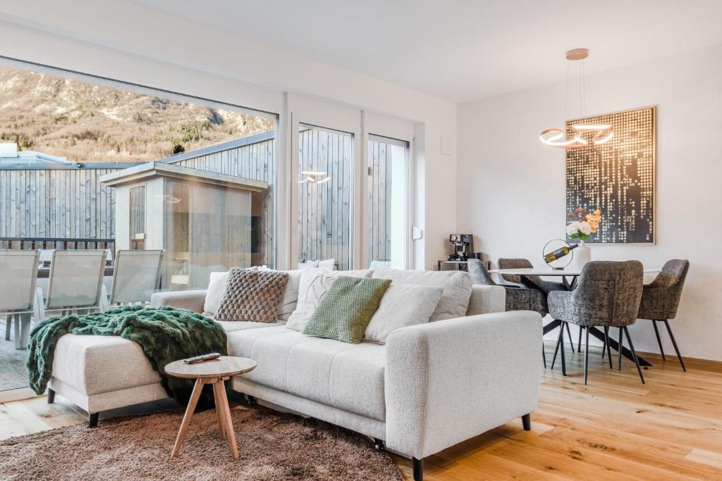 Et opholdsområde på Alps2sea Suite Apartment