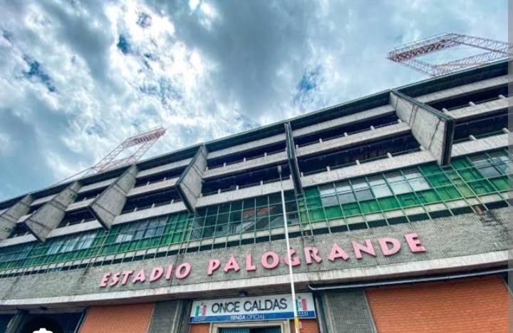 a building with a sign on the side of it at Casa estrella in Manizales