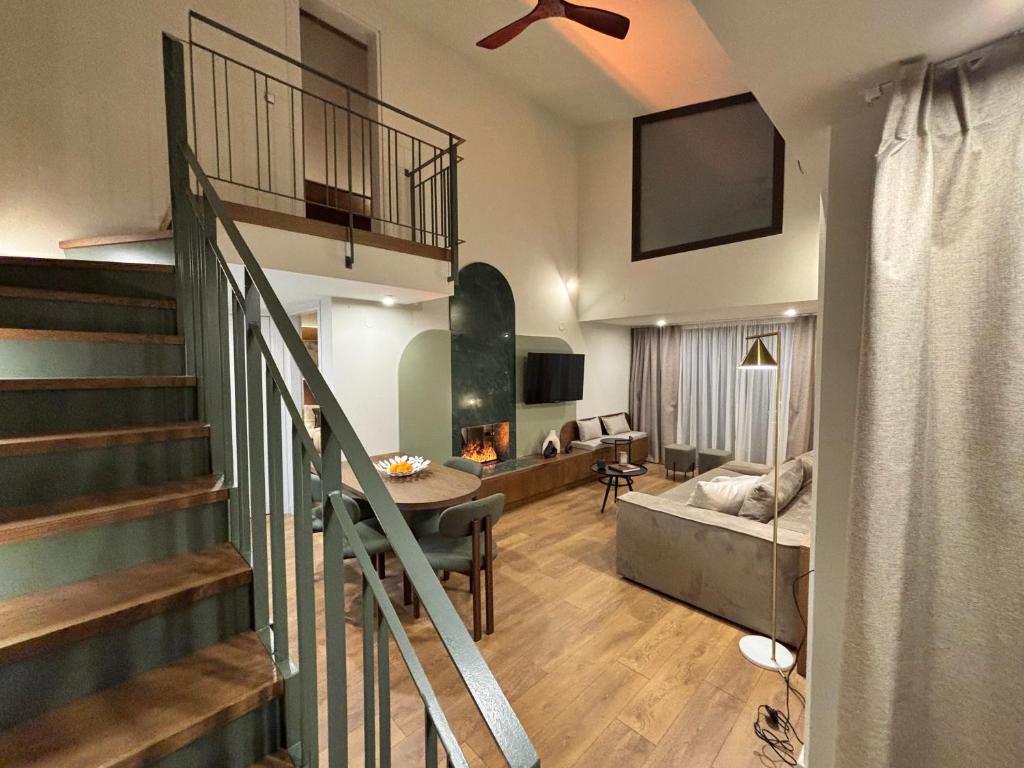 TV a/nebo společenská místnost v ubytování Epineio Comfort Living