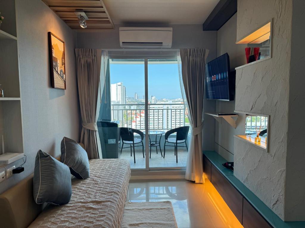 Et tv og/eller underholdning på Lumpini Park Beach Jomtien Pattaya Condo 21F