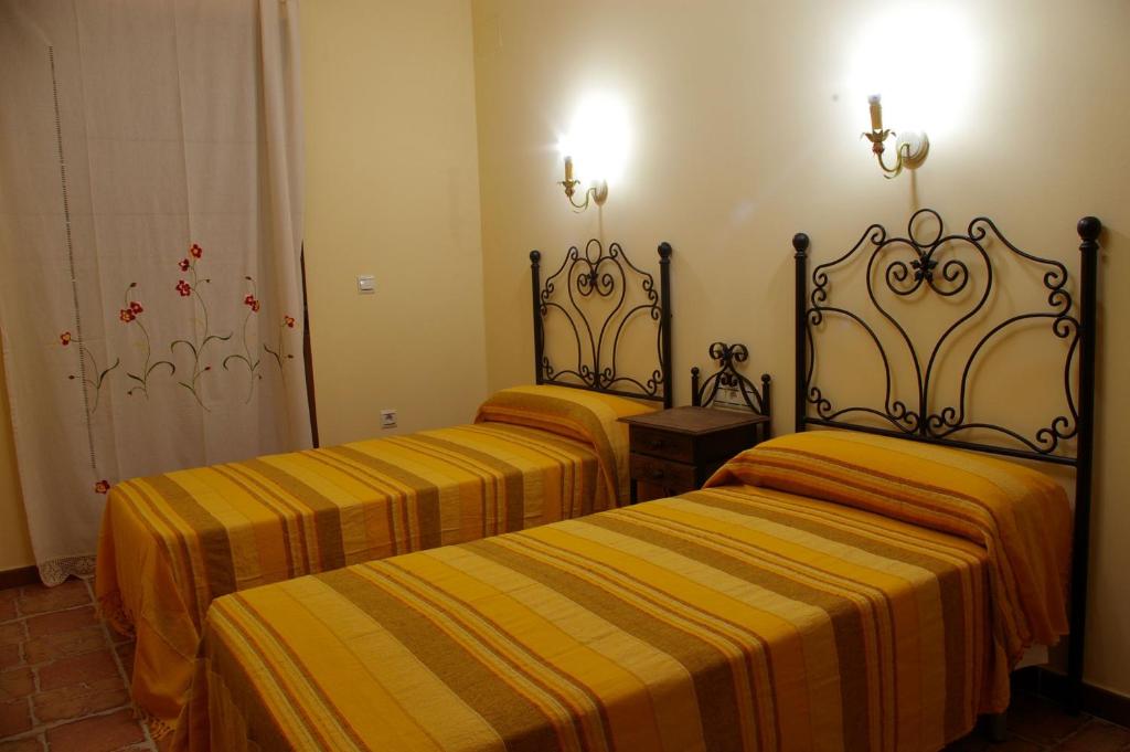 Postel nebo postele na pokoji v ubytování Villa de Xicar