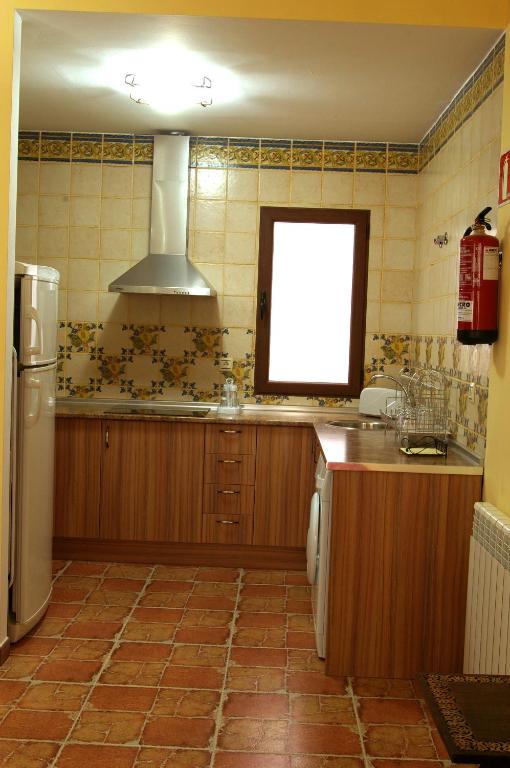 Kuchyň nebo kuchyňský kout v ubytování Villa de Xicar