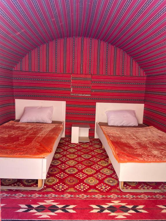 En eller flere senge i et værelse på Camp in the natural reserve & tours