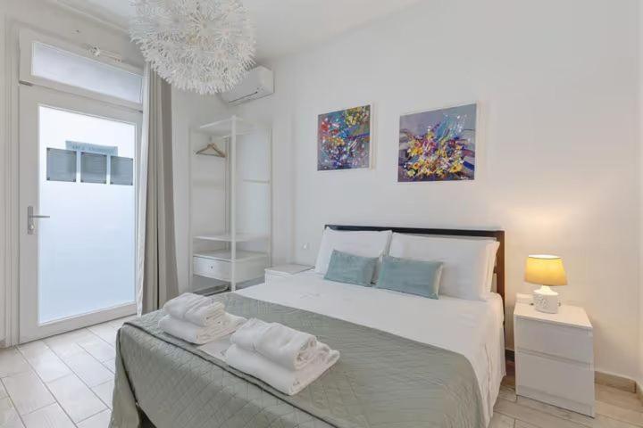 En eller flere senge i et værelse på Camere Amé Peschiera del Garda