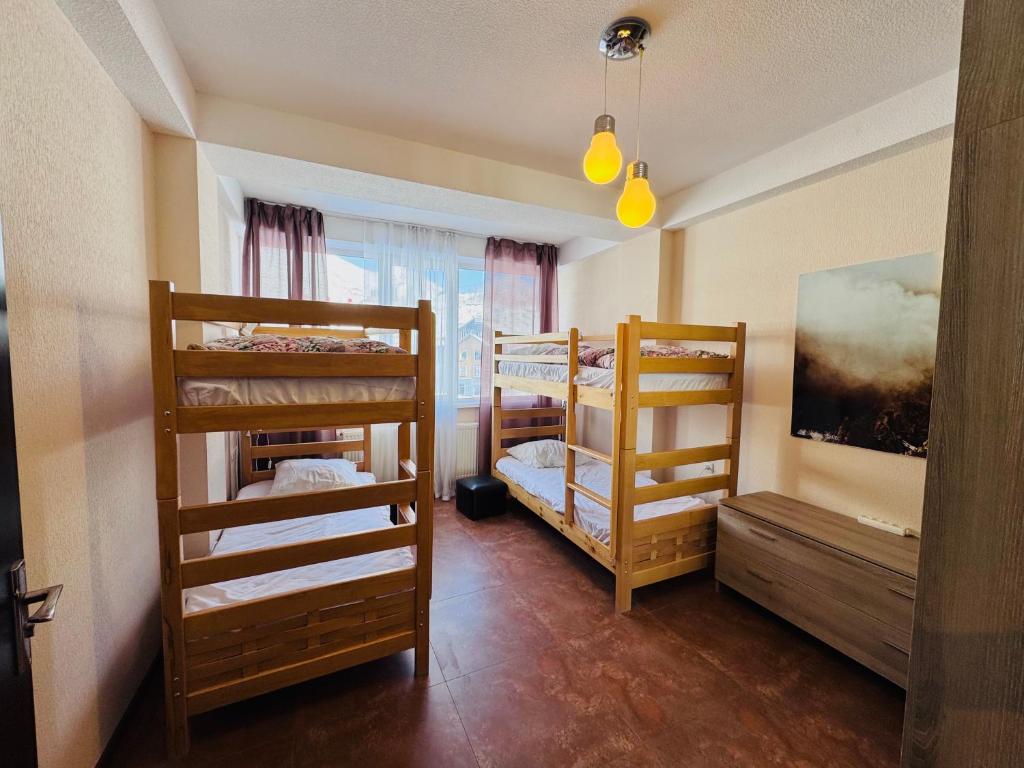 Кровать или кровати в номере 2-room Apartment NFT Gudauri Penta 404