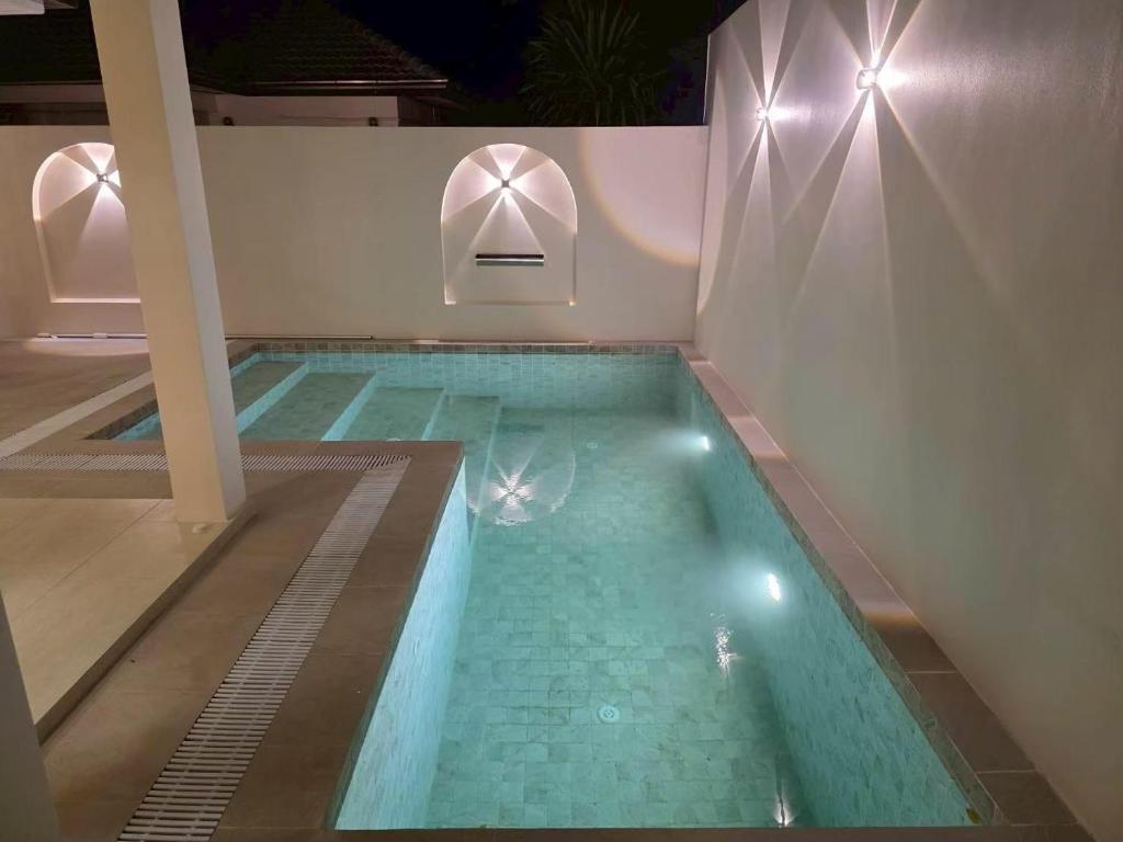 Bazén v ubytování La Perle Villa nebo v jeho okolí