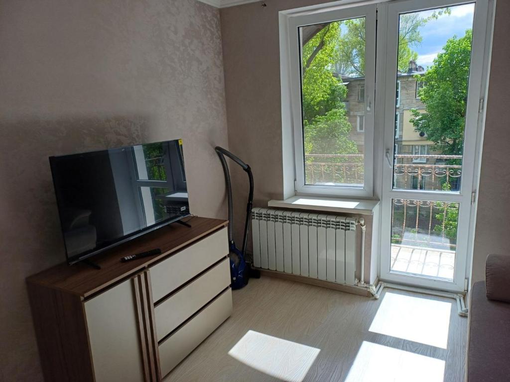 TV a/nebo společenská místnost v ubytování Up!House