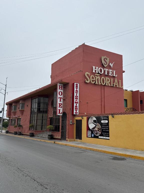 a hotel scientology building on the side of a street at Hotel Señorial in Matamoros