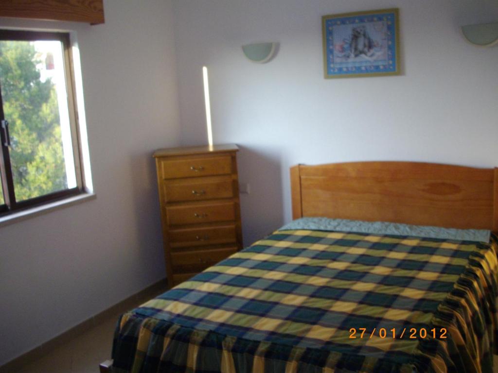 Postel nebo postele na pokoji v ubytování Apartamentos Leziria