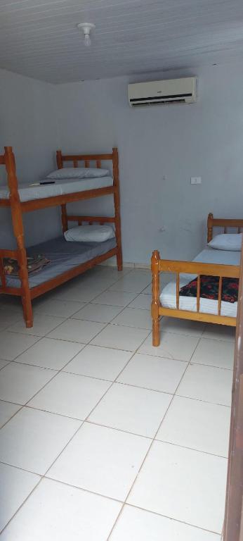 Postel nebo postele na pokoji v ubytování Hotel JRM