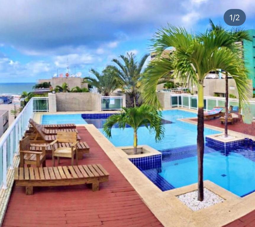 Swimmingpoolen hos eller tæt på Apartamento em Maceió a beira mar