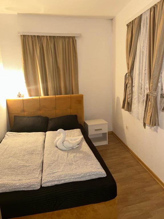 Postel nebo postele na pokoji v ubytování Pansion Most , Mostar