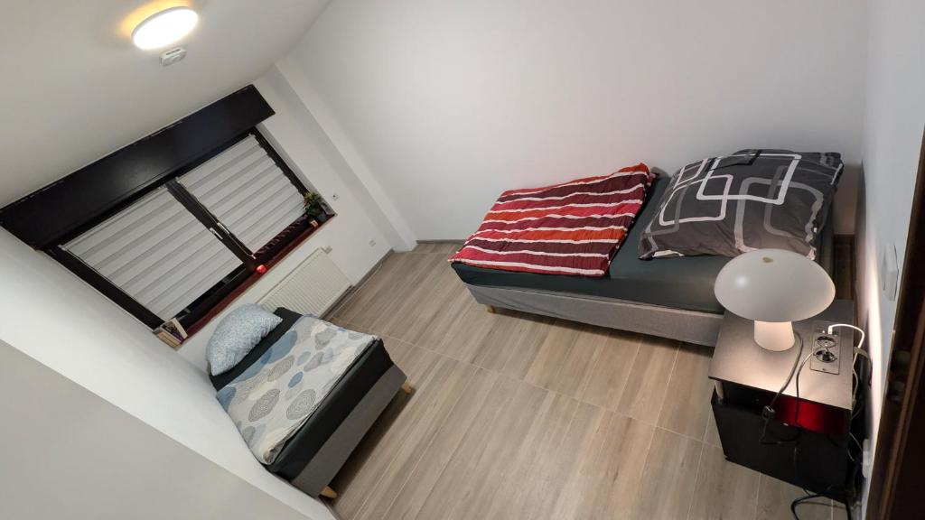 Postel nebo postele na pokoji v ubytování Alex Garden Apartments - EG - Terrasse - WLAN und Küche