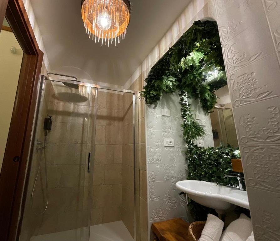 a bathroom with a shower and a sink at Ca' Teatro Vecchio in Manfredonia