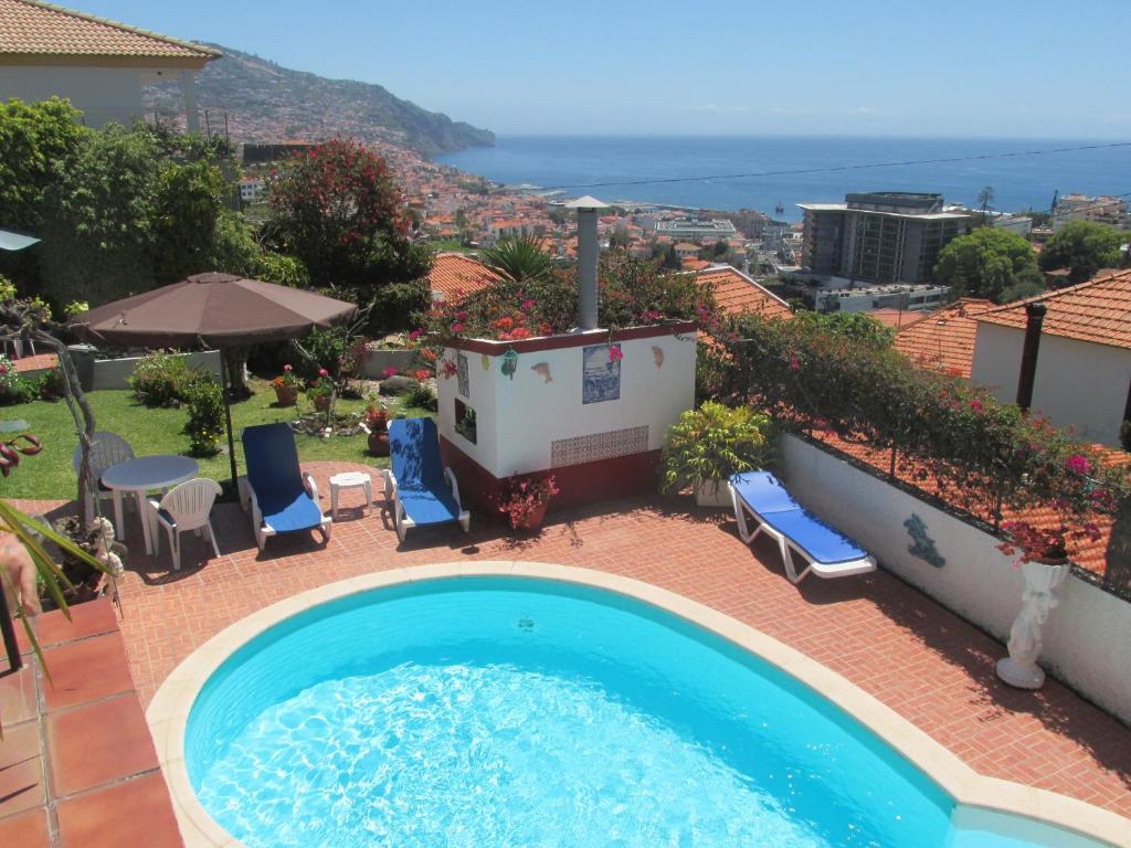 Bazén v ubytování Apartments Vista Oceano nebo v jeho okolí