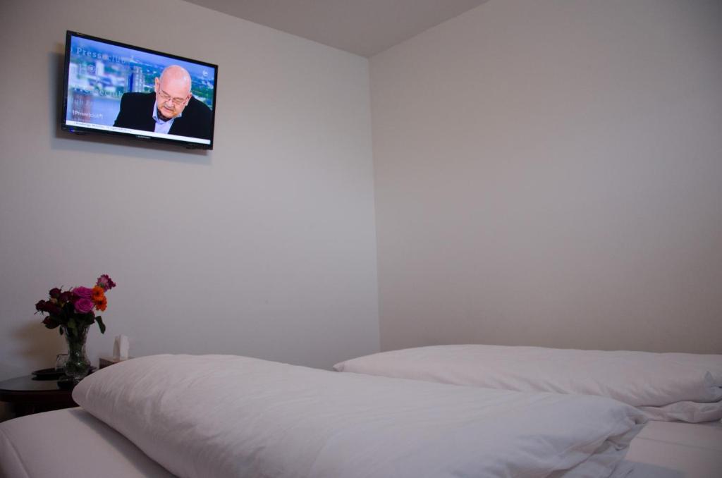 Postel nebo postele na pokoji v ubytování Panorama Hotel Frankfurt Offenbach Süd