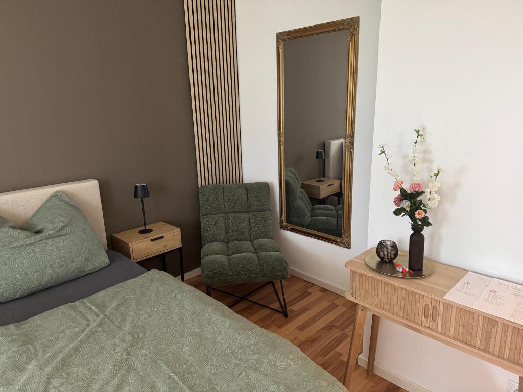 Ένα ή περισσότερα κρεβάτια σε δωμάτιο στο Helles Garten-Apartment in Graz