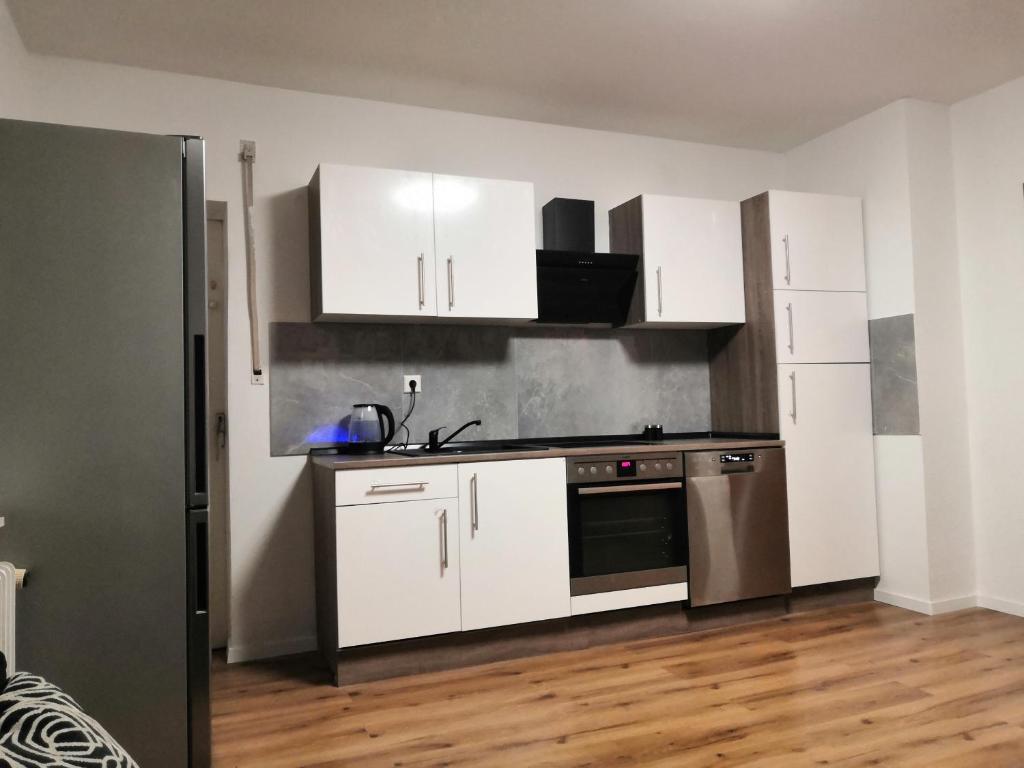 Η κουζίνα ή μικρή κουζίνα στο Luxapartament Schwerte Central