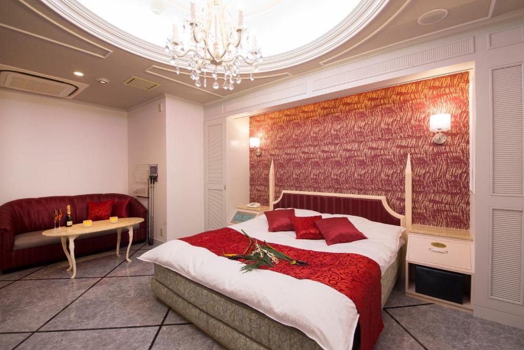 Postel nebo postele na pokoji v ubytování Hotel Rocco (Adult Only)