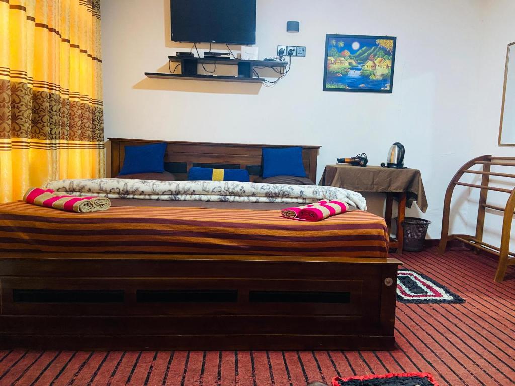 TV/trung tâm giải trí tại Nine arch eco Villa Ella