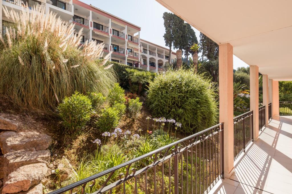 a view from the balcony of a apartment building at Résidence Pierre & Vacances l'Ange Gardien in Villefranche-sur-Mer