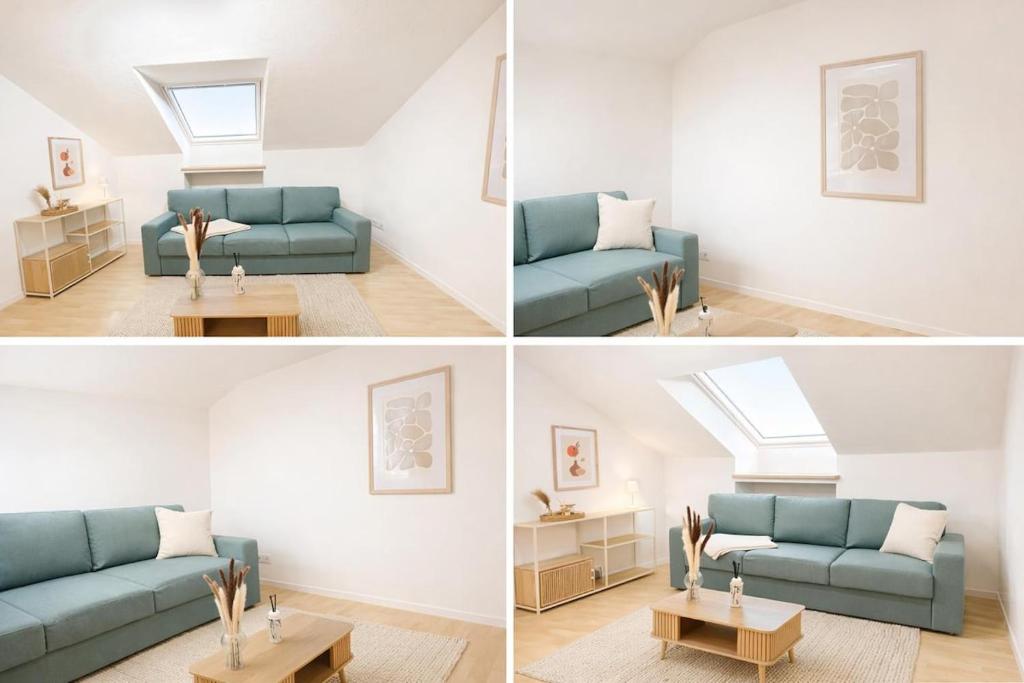 een woonkamer met een blauwe bank en een tafel bij Ferienwohnung MeDa in Bad Wörishofen