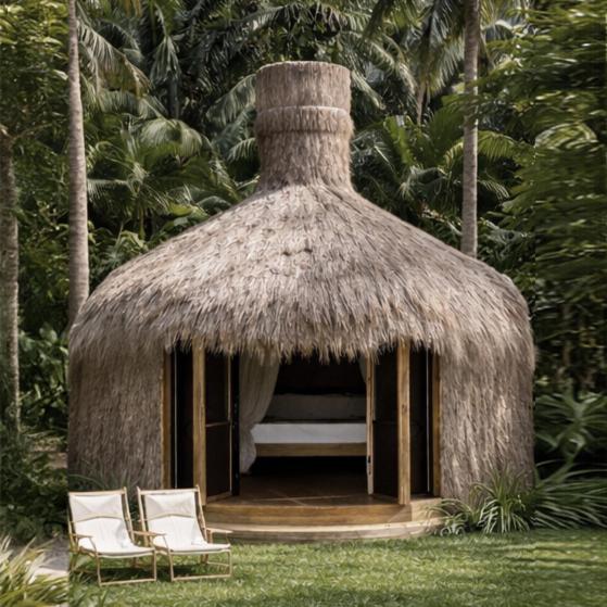 un gazebo con due sedie e un tetto di Cambaya Beach Resort a Busuanga