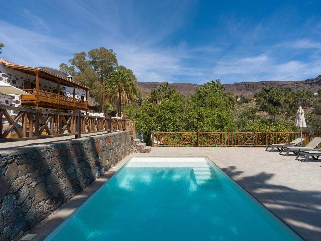 Swimmingpoolen hos eller tæt på Casa Rural La Longuera de Tirajana