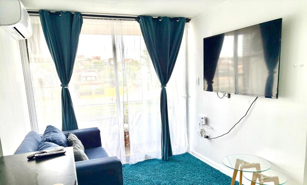 Et tv og/eller underholdning på Acogedor departamento en Constitución