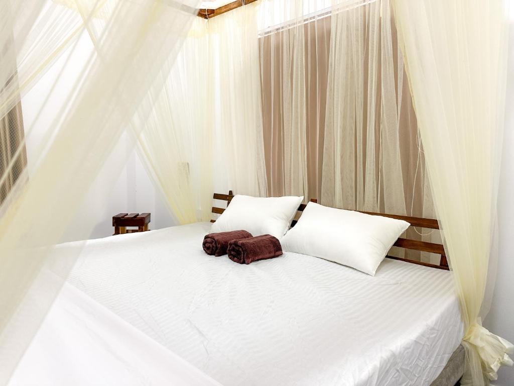 Ένα ή περισσότερα κρεβάτια σε δωμάτιο στο Dacha Retreat