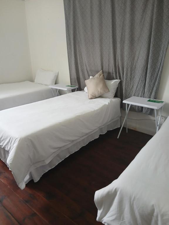 Postel nebo postele na pokoji v ubytování 34 Laburnum lodge