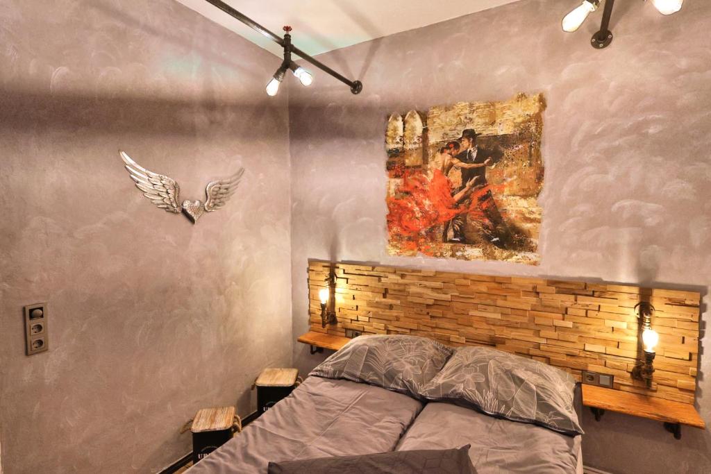 En eller flere senge i et værelse på Altstadtblick Altenburg