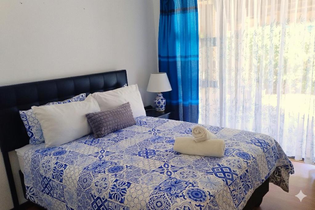 En eller flere senge i et værelse på Still Waters